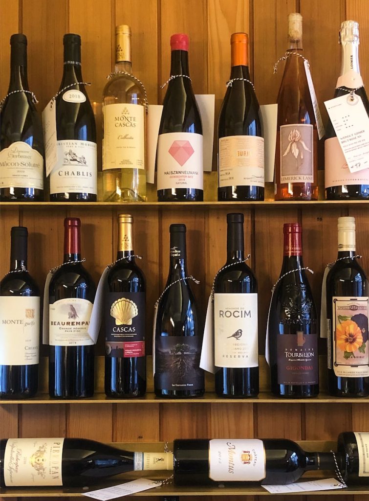 white labeled bottle on shelf